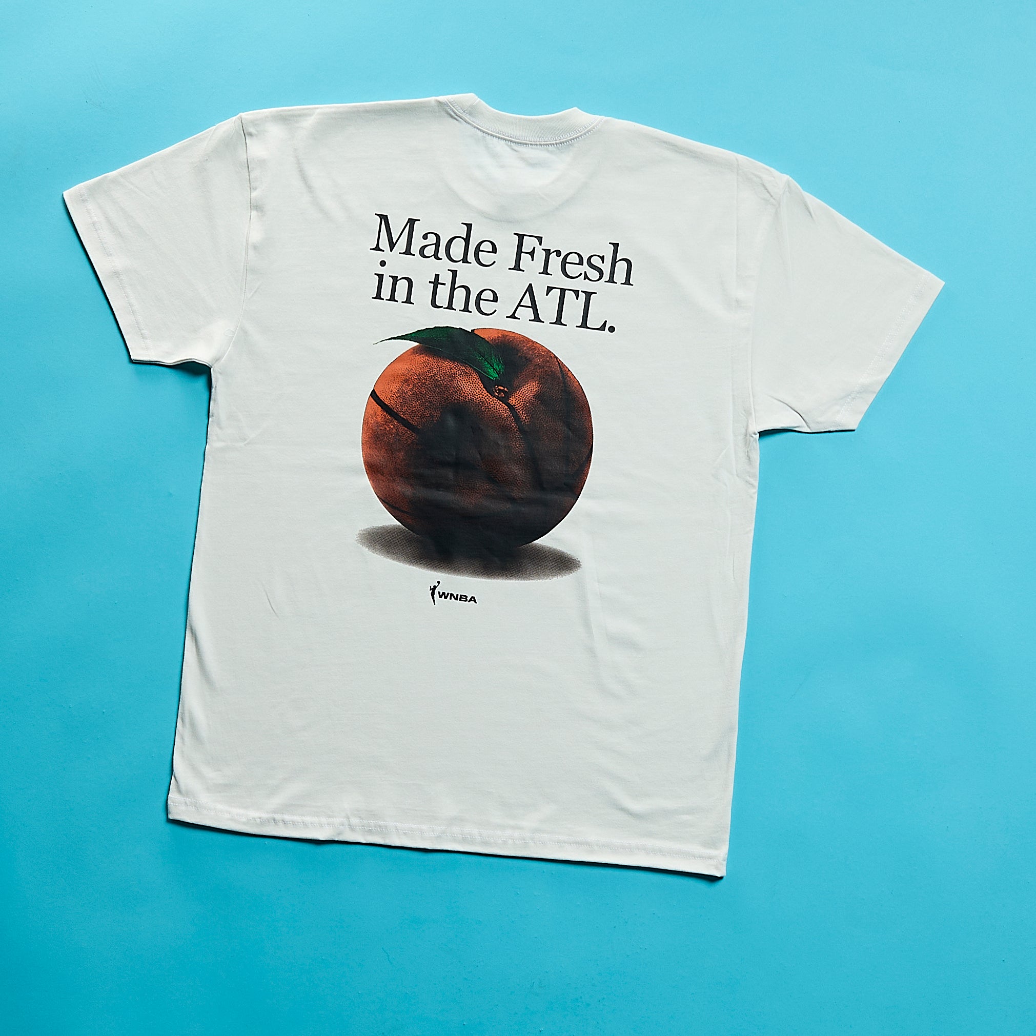 Made Fresh In the ATL shirt on a blue background