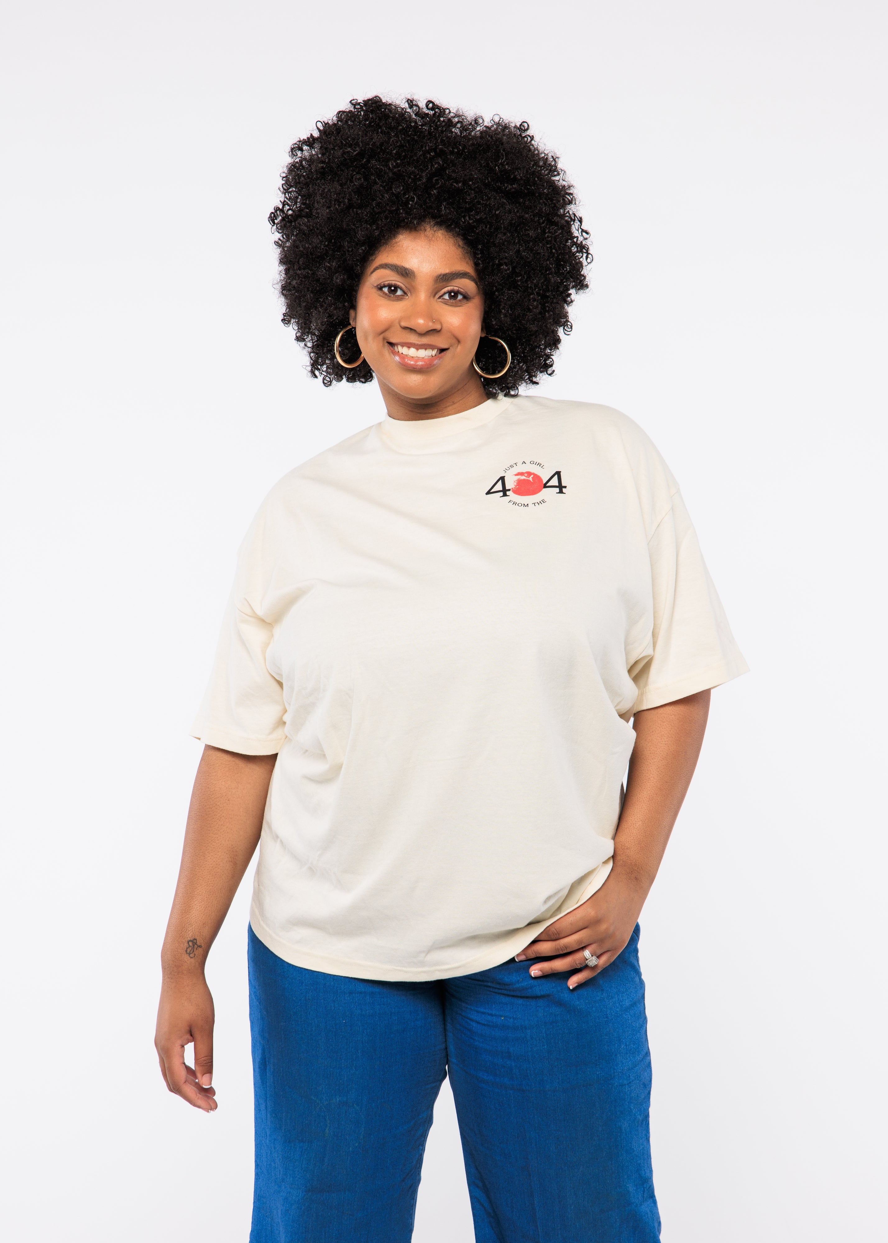Person wearing a white t-shirt