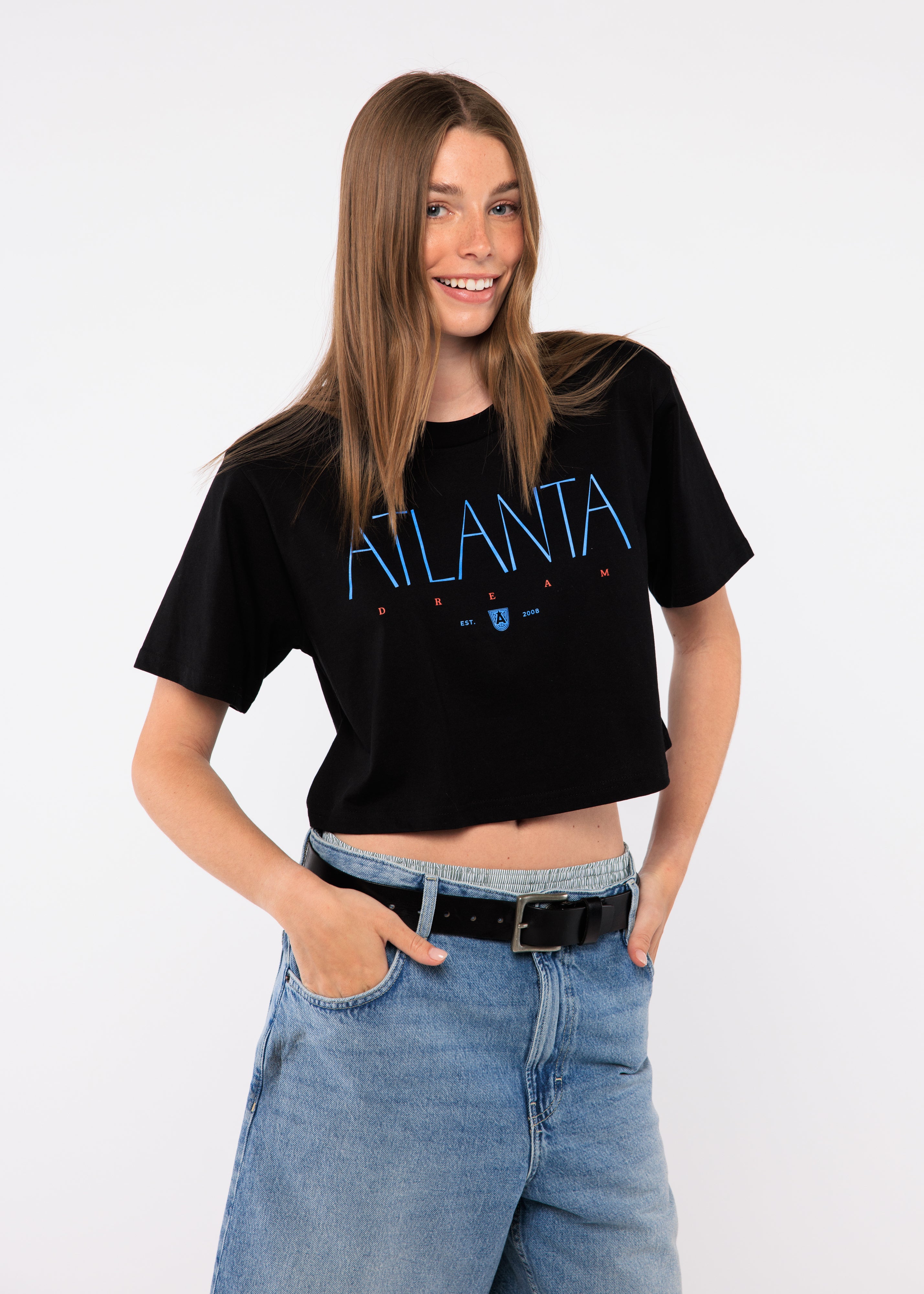 Wearing a black t-shirt with 'Atlanta' printed on it