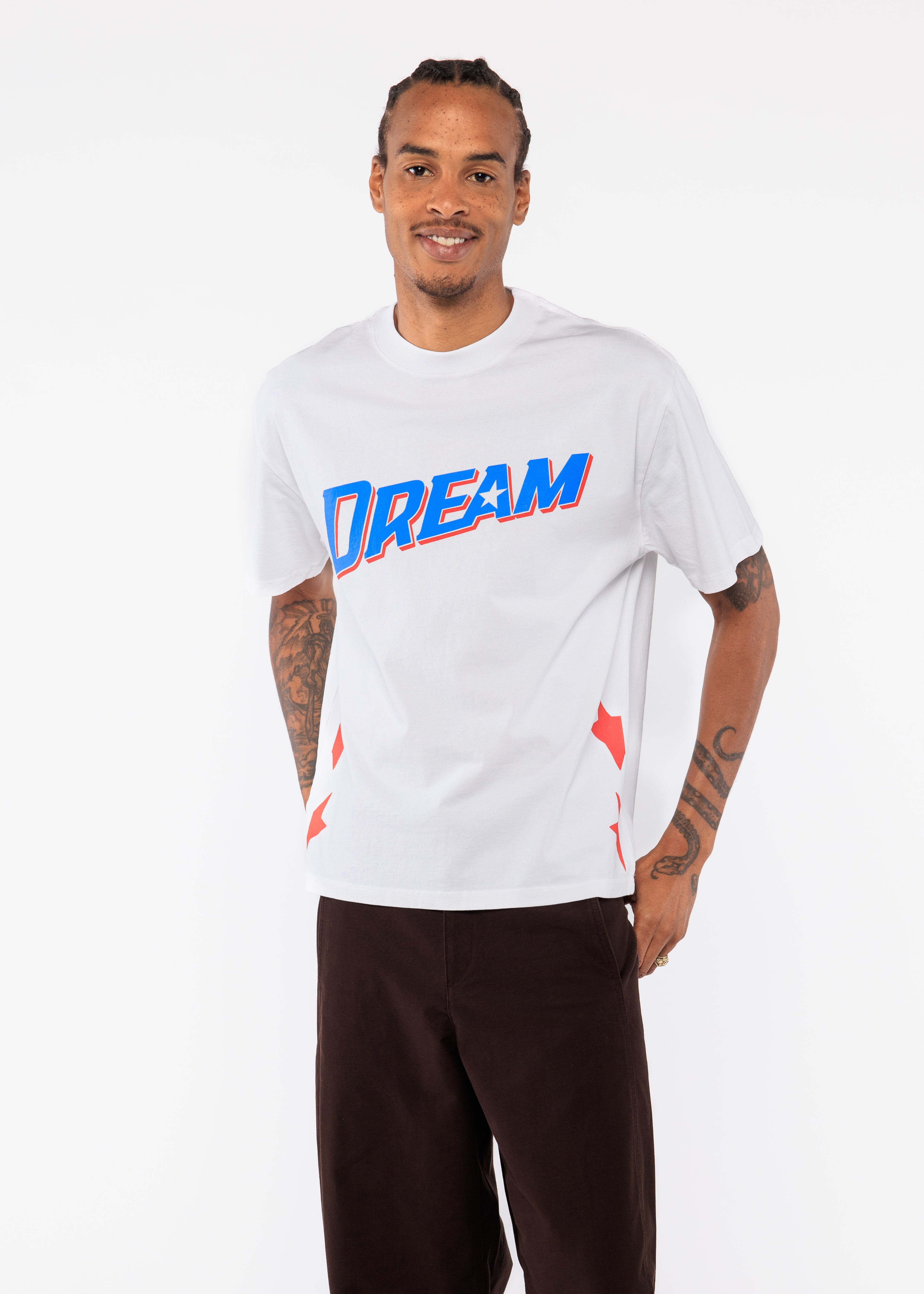 Man wearing a white t-shirt with colorful text