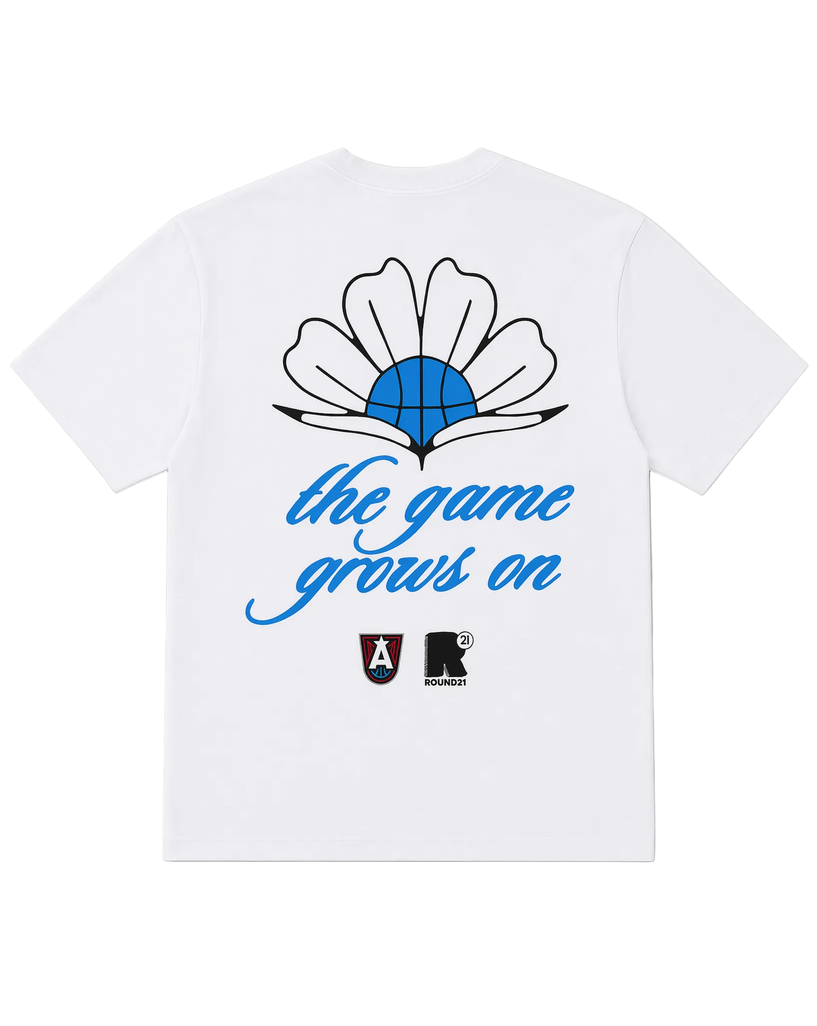 White t-shirt with a graphic of a flower and text 'the game grows on'