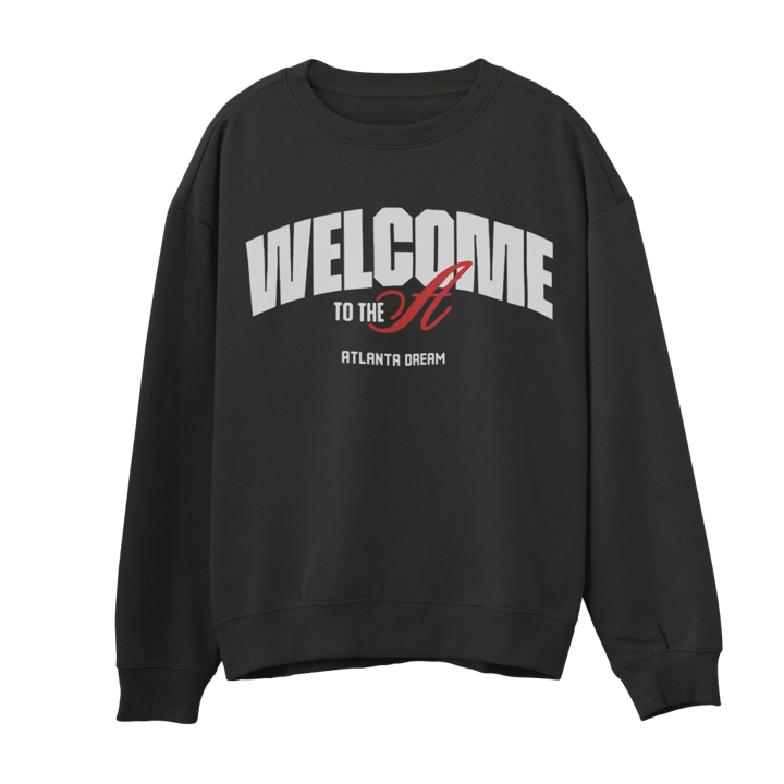 Welcome to the A Atlanta Dream Fleece Sweatshirt Black crewneck sweatshirt featuring the graphic "WELCOME TO THE A" in bold white and red text, with the Atlanta Dream logo and "ATLANTA DREAM" text below. The crewneck has a ribbed collar and cuffs, designed with a slimmer fit and made from soft 3-end fleece for comfort.